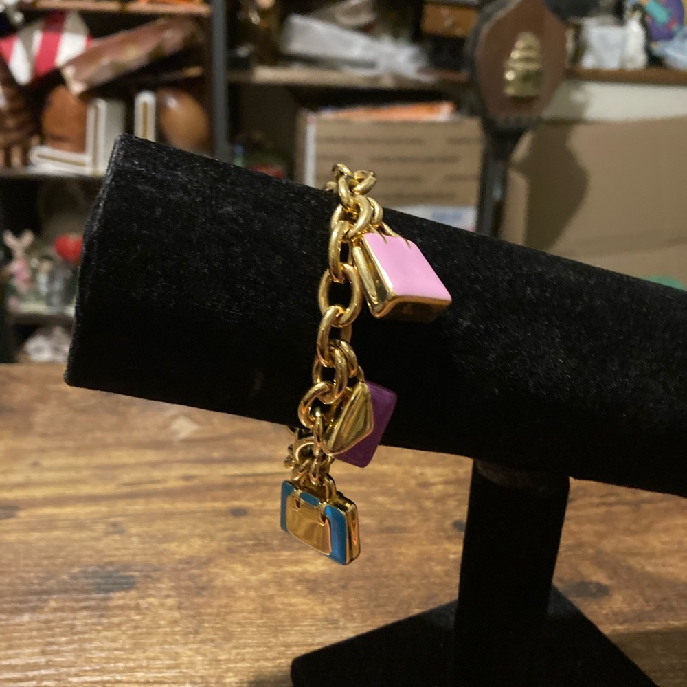 Voga 18k/resin gold and enamel charm bracelet